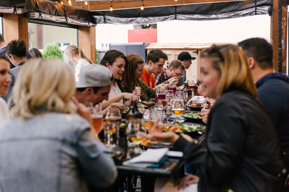 people at a bar hanging out